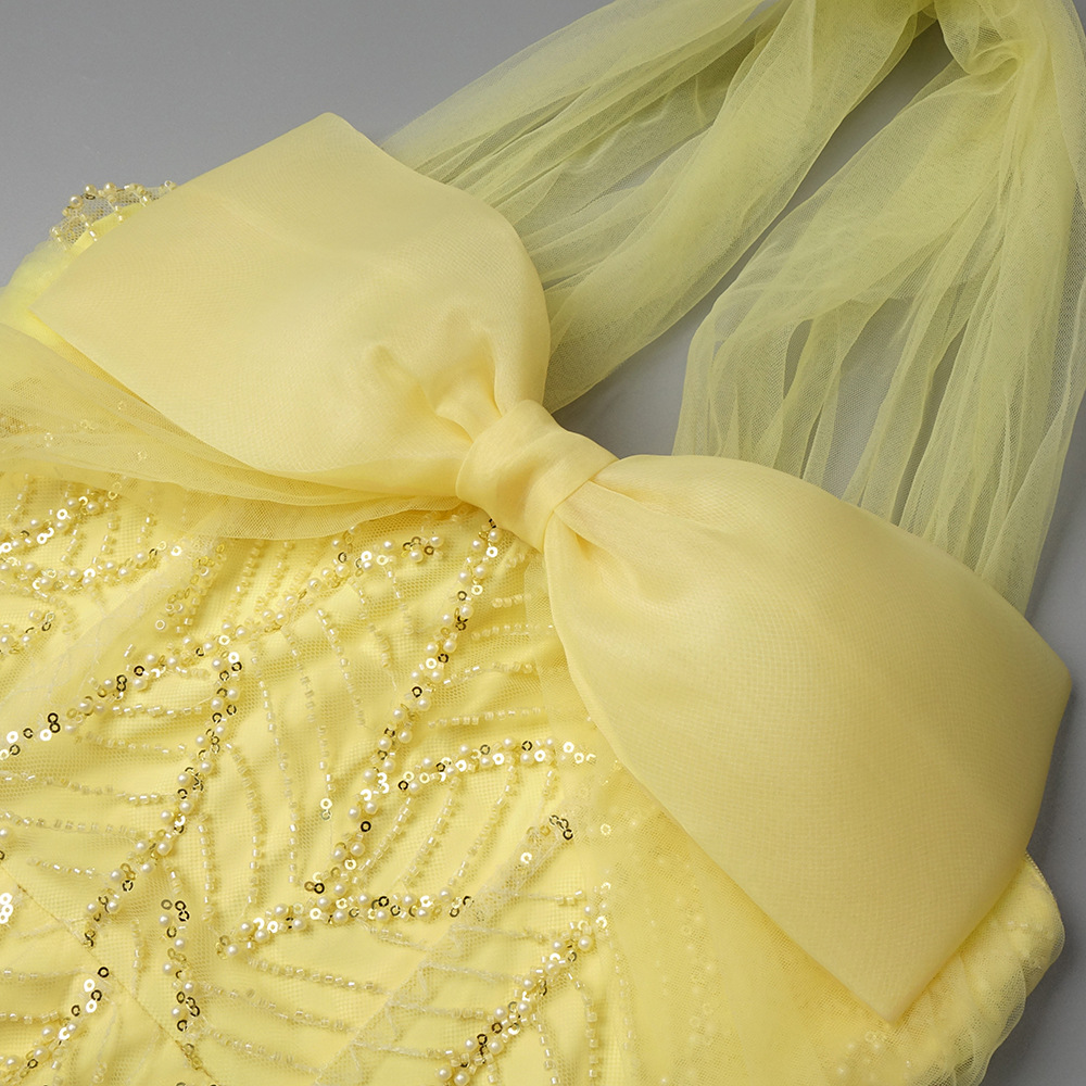 Vintage Fashion Exhibition - Vintage gele mesh pailletten galajurk elegante